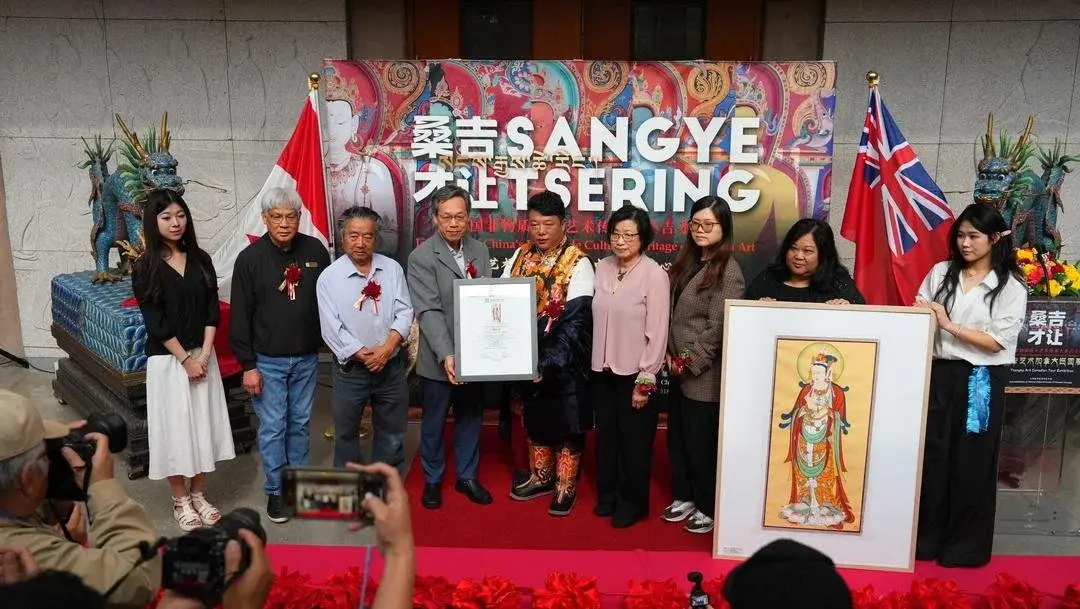 Certificate and thangka presentation at the exhibition